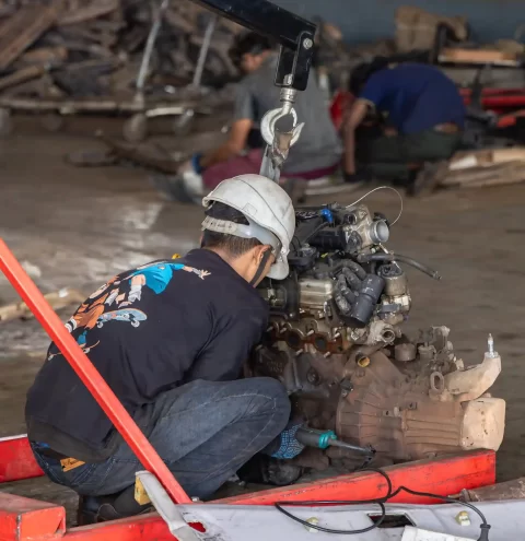 Car being dismantled for scrap metal, following government guidelines. 