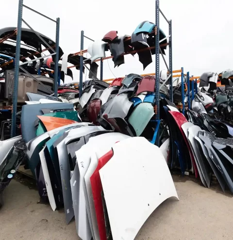 auto-parts-market-ground-are-doors-bumpers-windshields_11zon