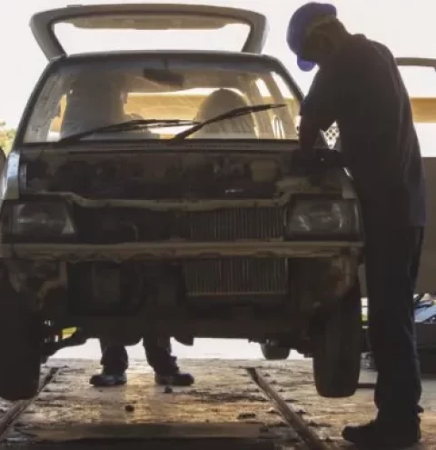  Car being dismantled at Miraai according to a careful and pretested process