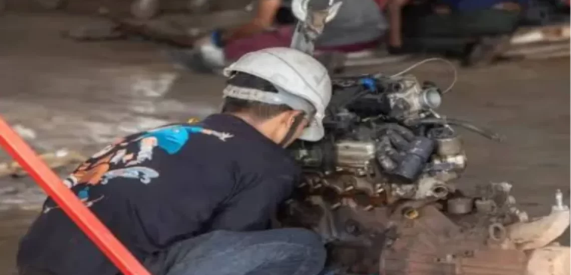 A mechanic at work at MIRAAI recycling facility in Goa